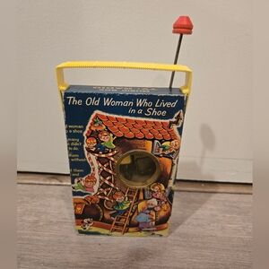 Vintage Fisher Price 'The Old Woman Who Lived in a Shoe' Wind-Up Toy Radio